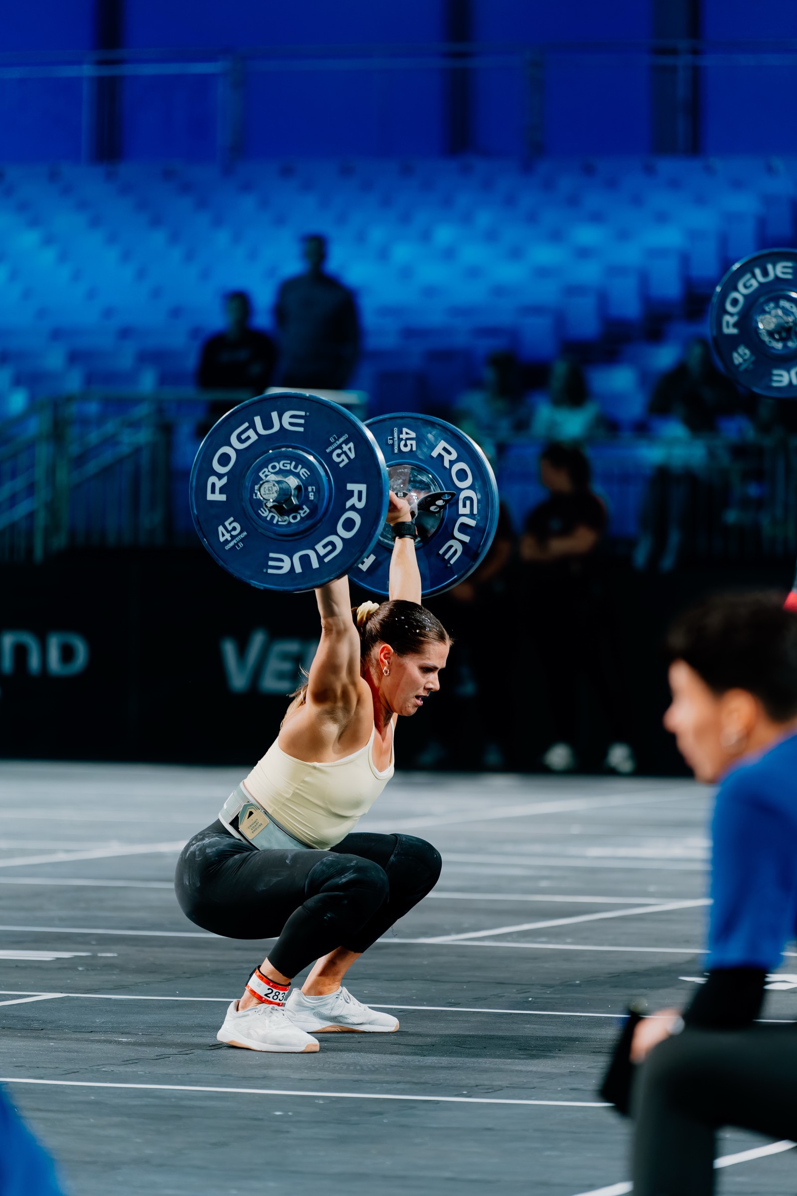 Kriger athlete in the bottom of an overhead squat on the competition floor